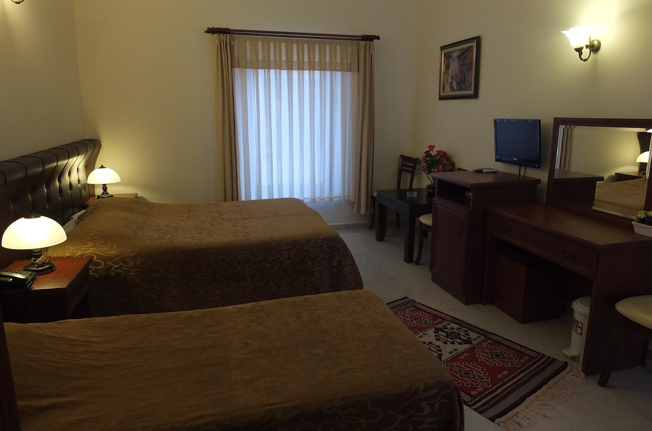 Bacahan Hotel Алтынолук Номер фото